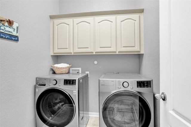 5250 Pueblo Ln, Frisco, TX 75034 - clothes washing area with washer and clothes dryer and cabinet space