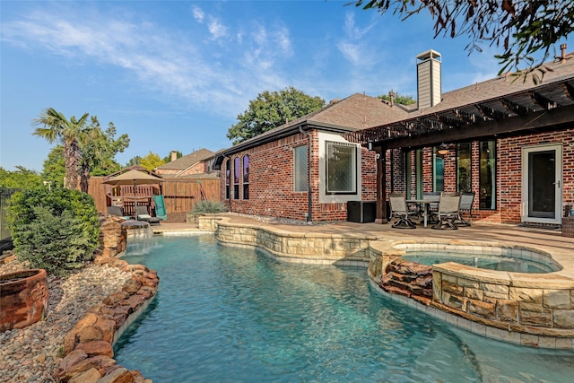 5250 Pueblo Ln, Frisco, TX 75034 - view of swimming pool with fence, a pool with connected hot tub, and a patio