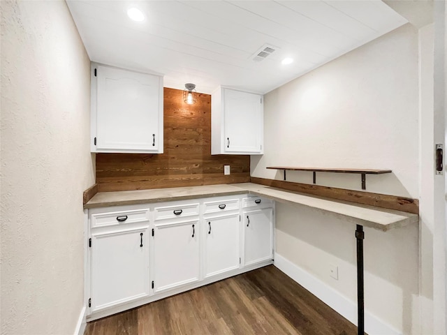 8 Woodmoor Cir, Lucas, TX 75002 - kitchen with white cabinets, dark wood-style flooring, baseboards, light countertops, and wooden walls