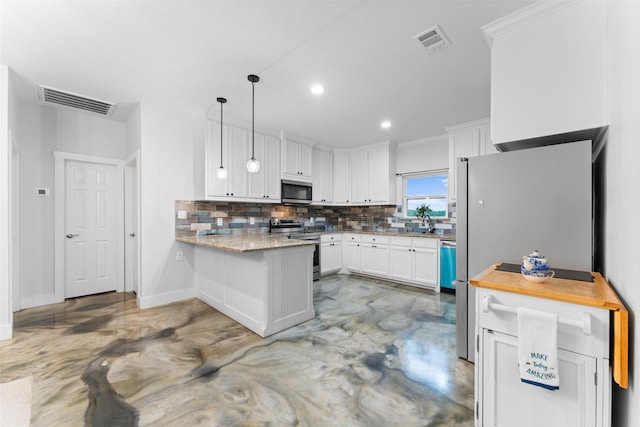 555 Advance Rd, Weatherford, TX 76088 - kitchen with stainless steel appliances, a peninsula, tasteful backsplash, white cabinetry, and concrete flooring