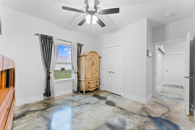 555 Advance Rd, Weatherford, TX 76088 - unfurnished bedroom with concrete floors, baseboards, a closet, and ceiling fan