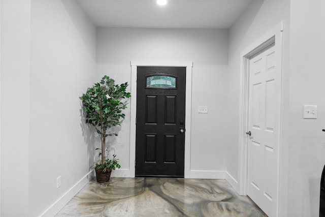 555 Advance Rd, Weatherford, TX 76088 - entryway featuring baseboards and concrete floors