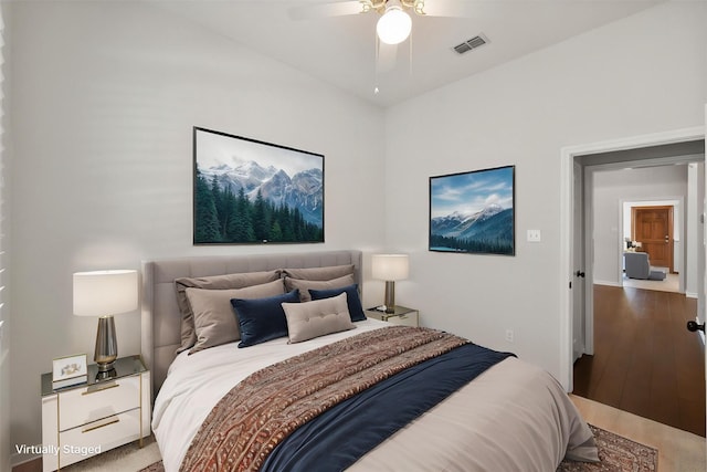 bedroom featuring wood finished floors and ceiling fan
