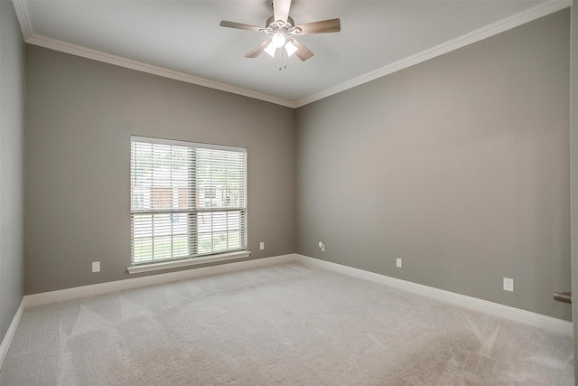 unfurnished room with light carpet, ceiling fan, ornamental molding, and baseboards