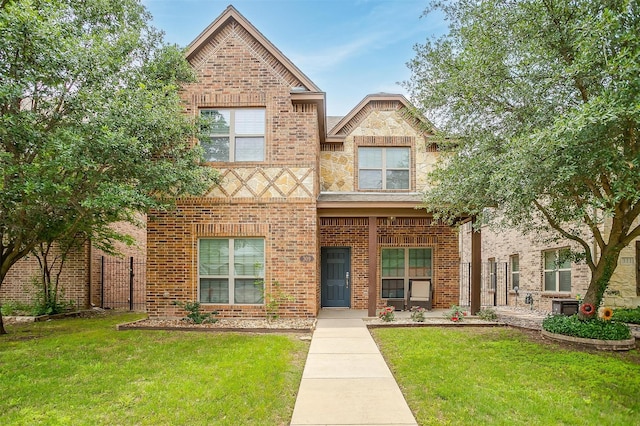 view of front of property featuring brick siding