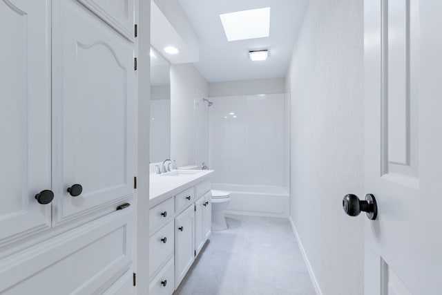 609 W Windsor Dr, Denton, TX 76207 - full bathroom featuring a skylight, vanity, shower / bath combination, toilet, and baseboards