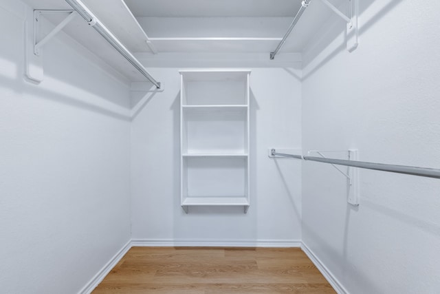 609 W Windsor Dr, Denton, TX 76207 - spacious closet with wood finished floors