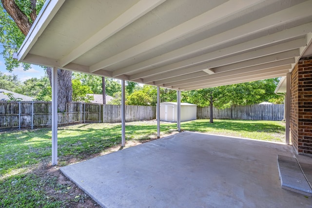609 W Windsor Dr, Denton, TX 76207 - view of patio with a shed and an outdoor structure