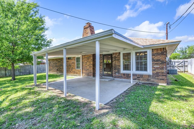 609 W Windsor Dr, Denton, TX 76207 - view of patio featuring central AC