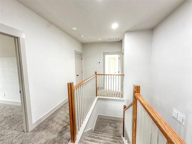196 Jim Walter Dr, Runaway Bay, TX 76426 - staircase featuring carpet floors, baseboards, and recessed lighting