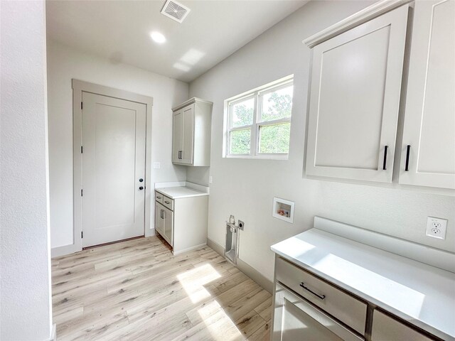 196 Jim Walter Dr, Runaway Bay, TX 76426 - washroom with cabinet space, washer hookup, light wood-style floors, recessed lighting, and baseboards