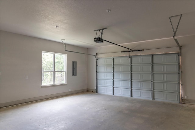 196 Jim Walter Dr, Runaway Bay, TX 76426 - garage featuring a garage door opener, electric panel, and baseboards