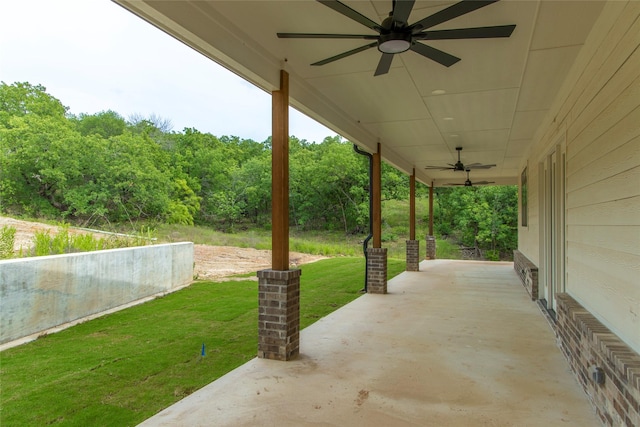 196 Jim Walter Dr, Runaway Bay, TX 76426 - view of patio / terrace featuring a ceiling fan and a view of trees