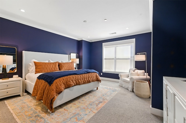 carpeted bedroom featuring baseboards, crown molding, and recessed lighting