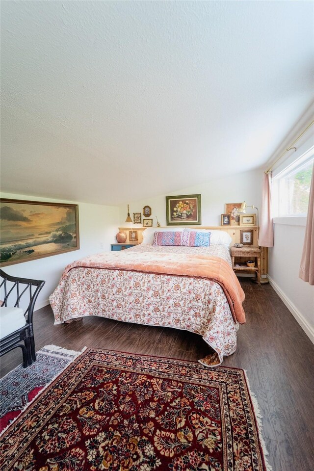 7006 Horseshoe Bend Trl, Weatherford, TX 76087 - bedroom with baseboards and wood finished floors
