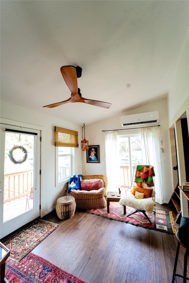 7006 Horseshoe Bend Trl, Weatherford, TX 76087 - living room featuring a ceiling fan, wood finished floors, and a wall mounted AC