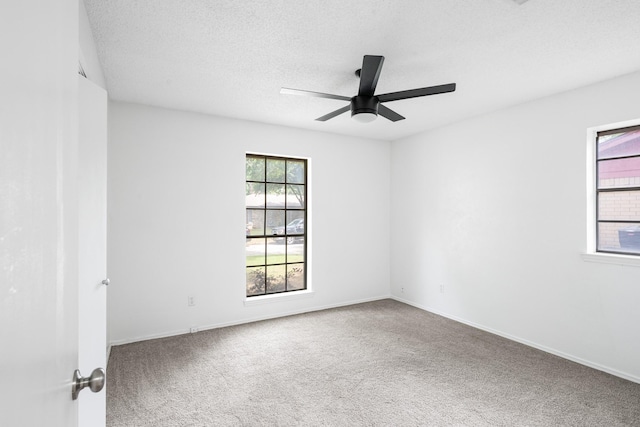1710 Windsor Dr, Arlington, TX 76012 - carpeted spare room with a ceiling fan, a textured ceiling, and baseboards
