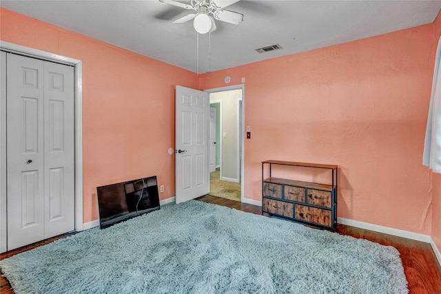 116 Nottingham Cir, Bridgeport, TX 76426 - bedroom with baseboards, ceiling fan, wood finished floors, and a closet
