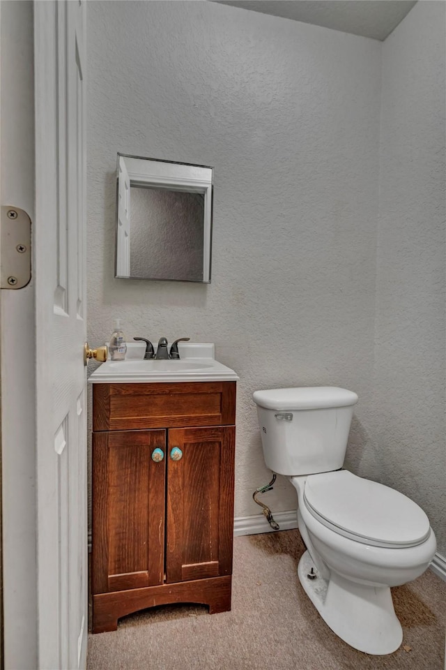 116 Nottingham Cir, Bridgeport, TX 76426 - bathroom featuring toilet, vanity, and baseboards