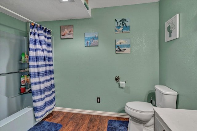 116 Nottingham Cir, Bridgeport, TX 76426 - full bathroom with wood finished floors, toilet, vanity, baseboards, and shower / bath combination with curtain