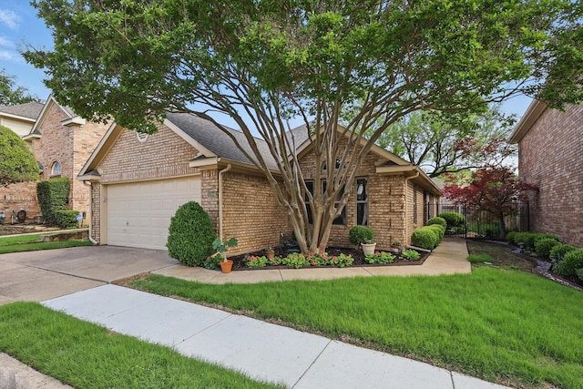 view of front of property featuring concrete driveway, a garage, and brick siding