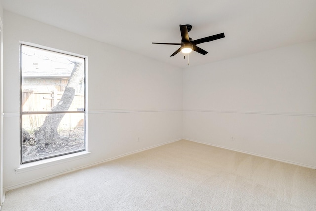 5129 Woodmeadow Ct, Garland, TX 75043 - carpeted empty room with ceiling fan and baseboards