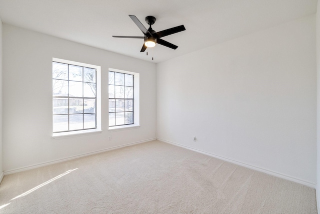 5129 Woodmeadow Ct, Garland, TX 75043 - carpeted spare room featuring baseboards and ceiling fan