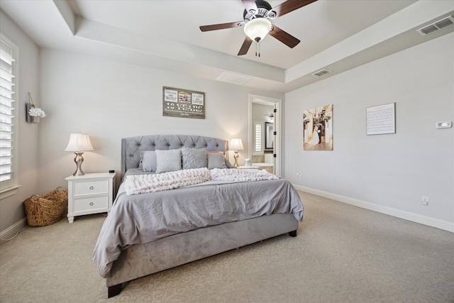 580 Butchart Dr, Prosper, TX 75078 - bedroom with carpet floors, a tray ceiling, baseboards, and multiple windows
