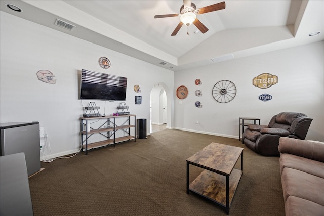 580 Butchart Dr, Prosper, TX 75078 - living room featuring arched walkways, ceiling fan, carpet floors, vaulted ceiling, and baseboards