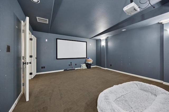 580 Butchart Dr, Prosper, TX 75078 - carpeted home theater room with baseboards and lofted ceiling