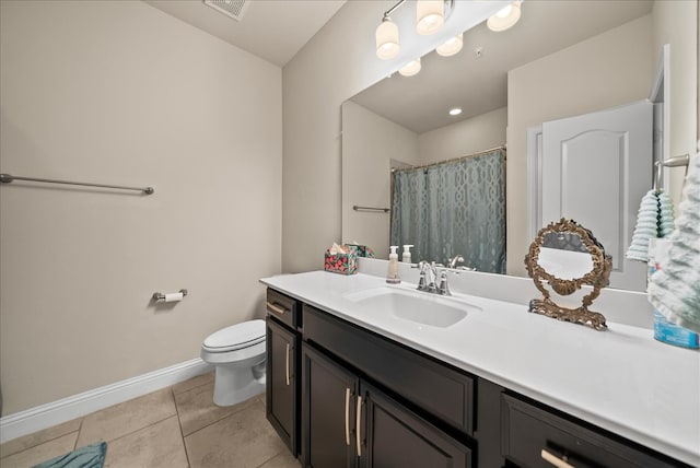 full bath featuring baseboards, toilet, vanity, tile patterned flooring, and curtained shower