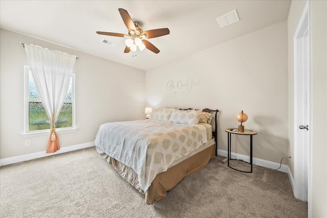 bedroom with carpet flooring, baseboards, and ceiling fan