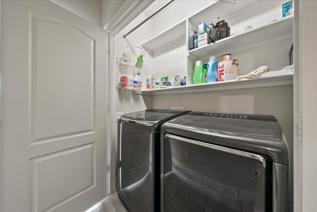 laundry area with washing machine and dryer