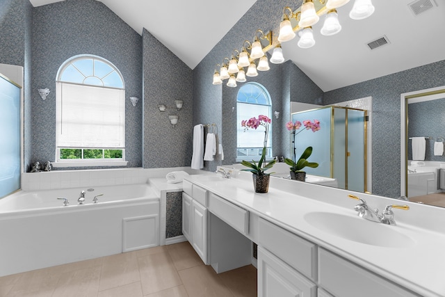 2830 Faversham Dr, Richardson, TX 75082 - full bath featuring lofted ceiling, healthy amount of natural light, a garden tub, a shower stall, and a chandelier