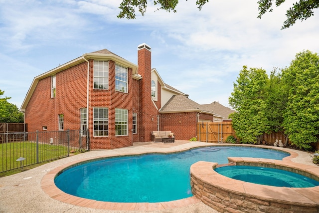 2830 Faversham Dr, Richardson, TX 75082 - view of swimming pool featuring a patio, a fenced backyard, outdoor lounge area, and a pool with connected hot tub