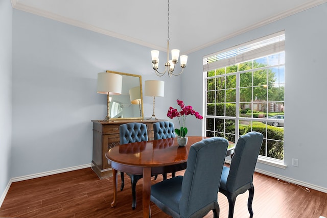 2830 Faversham Dr, Richardson, TX 75082 - dining space featuring crown molding, baseboards, a chandelier, and wood finished floors