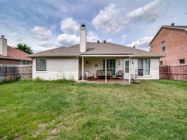 305 Rustic Meadows Dr, Royse City, TX 75189 - rear view of house with a patio, an outdoor hangout area, and a chimney