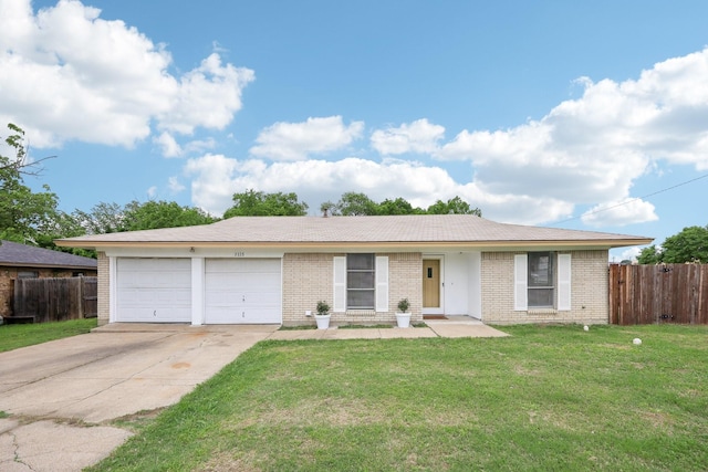 2115 Southridge Dr, Arlington, TX 76010 - single story home featuring an attached garage, driveway, and brick siding