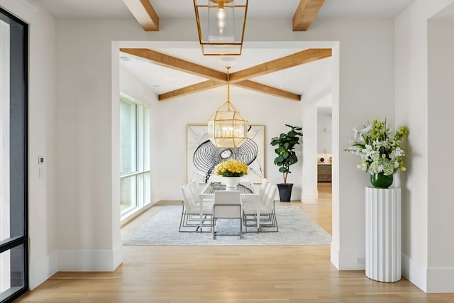 1405 Ridge Cir, Westlake, TX 76262 - dining space featuring a chandelier, beamed ceiling, wood finished floors, and baseboards