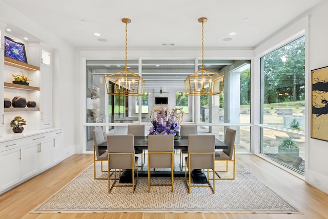 1405 Ridge Cir, Westlake, TX 76262 - dining space with light wood-style flooring and a chandelier