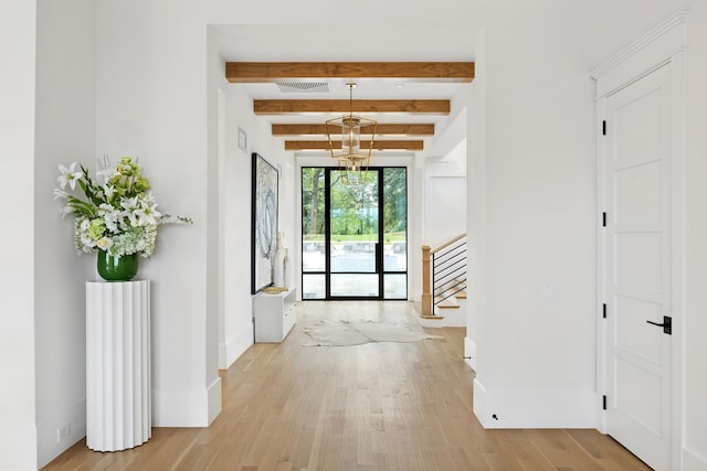 1405 Ridge Cir, Westlake, TX 76262 - entryway featuring light wood-type flooring, beam ceiling, stairs, and baseboards