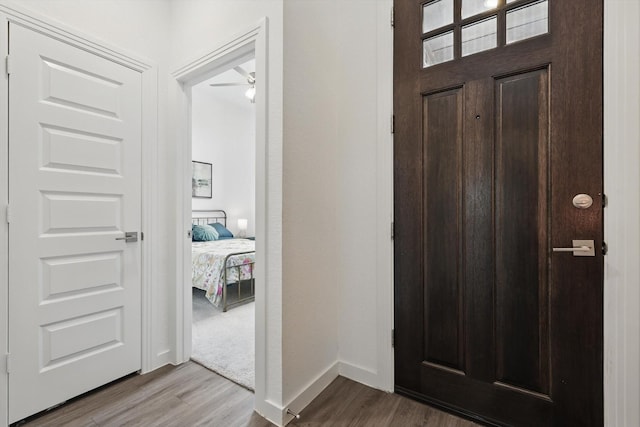 1606 Dreamers Way, Wylie, TX 75098 - foyer entrance with wood finished floors, baseboards, and a ceiling fan