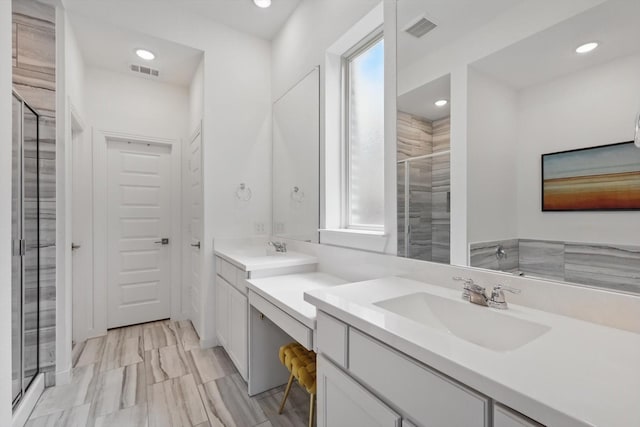 1606 Dreamers Way, Wylie, TX 75098 - bathroom featuring a shower stall, recessed lighting, and two vanities