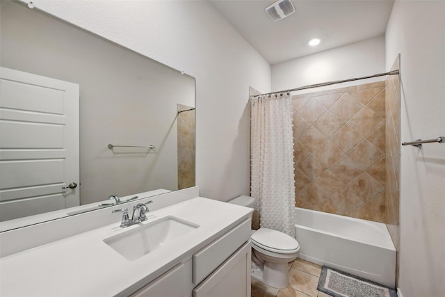 bathroom featuring toilet, tile patterned floors, vanity, and shower / bath combination with curtain