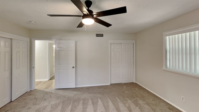 5828 Cynthia Cir, North Richland Hills, TX 76117 - unfurnished bedroom featuring carpet floors, baseboards, and ceiling fan