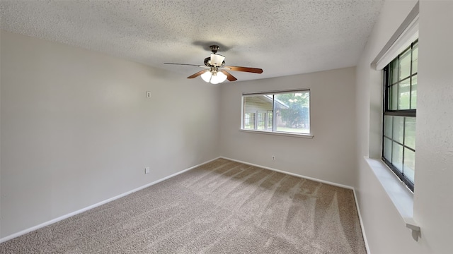 5828 Cynthia Cir, North Richland Hills, TX 76117 - empty room with carpet flooring, a textured ceiling, ceiling fan, and baseboards