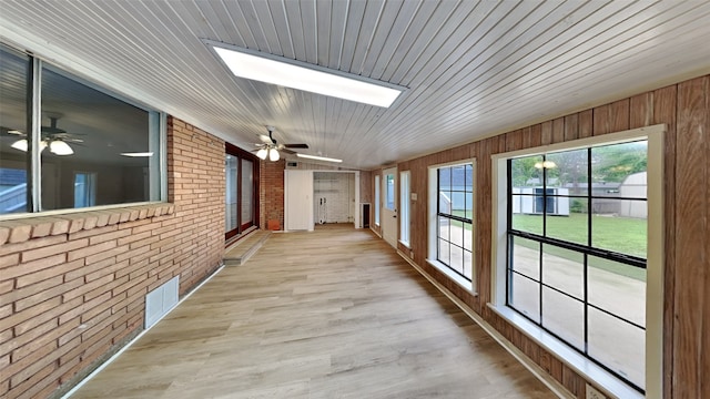 5828 Cynthia Cir, North Richland Hills, TX 76117 - unfurnished sunroom featuring a skylight