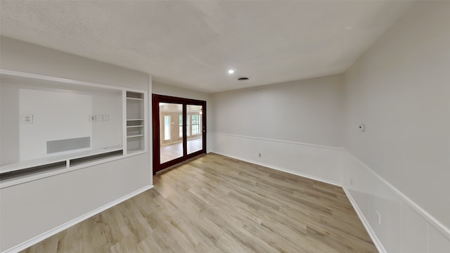 5828 Cynthia Cir, North Richland Hills, TX 76117 - spare room with light wood-style flooring, baseboards, and recessed lighting