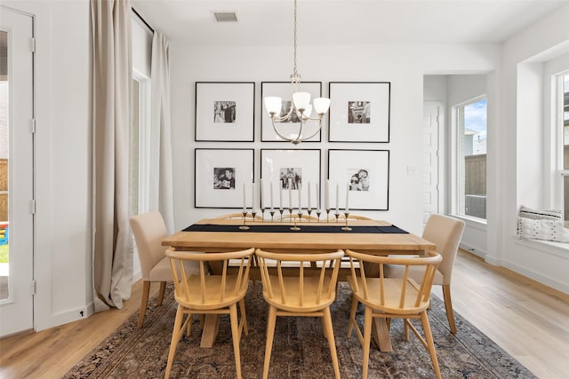 3545 W Cheney Ave, Celina, TX 75009 - dining area featuring a chandelier and light wood-style floors