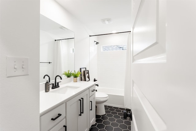 3545 W Cheney Ave, Celina, TX 75009 - full bath with toilet, vanity, shower / tub combo, and tile patterned flooring